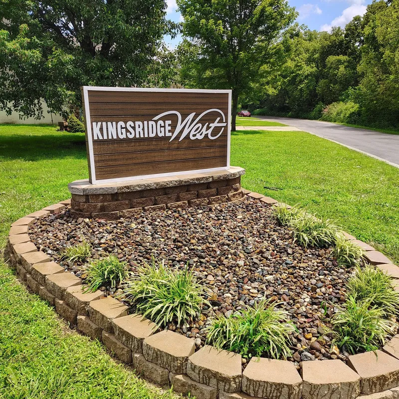 Neighborhood entry sign representing local service across east Kansas City metro communities