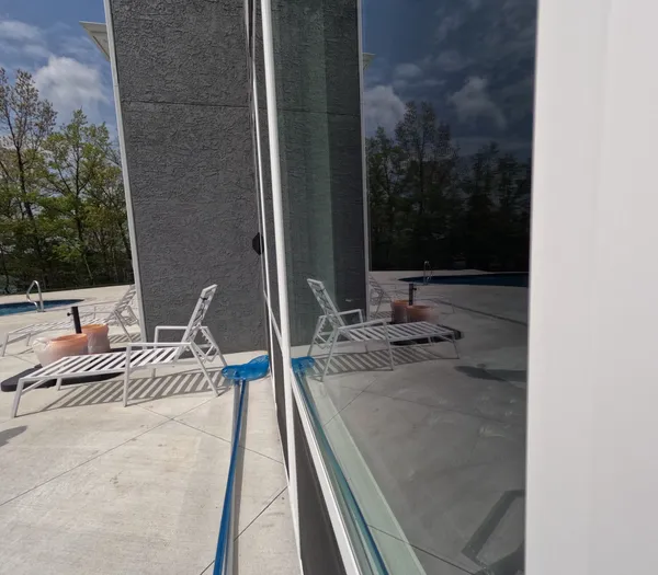 Residential windows prepared for exterior window washing service